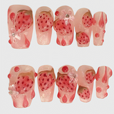 Trapezoid-shaped pink press on nails with 3D strawberry design, jelly gloss texture, droplets and butterfly rhinestone accents