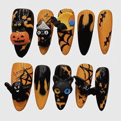 Reusable Halloween press on nails featuring 3D black cats, pumpkins, spider webs, and bats for festive nail art
