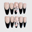 Almond-shaped press on nails in nude and black with 3D pink lily flower design