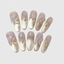 Almond-shaped press-on nails with gold gradient finish, 3D butterfly decorations, and crystal vines.