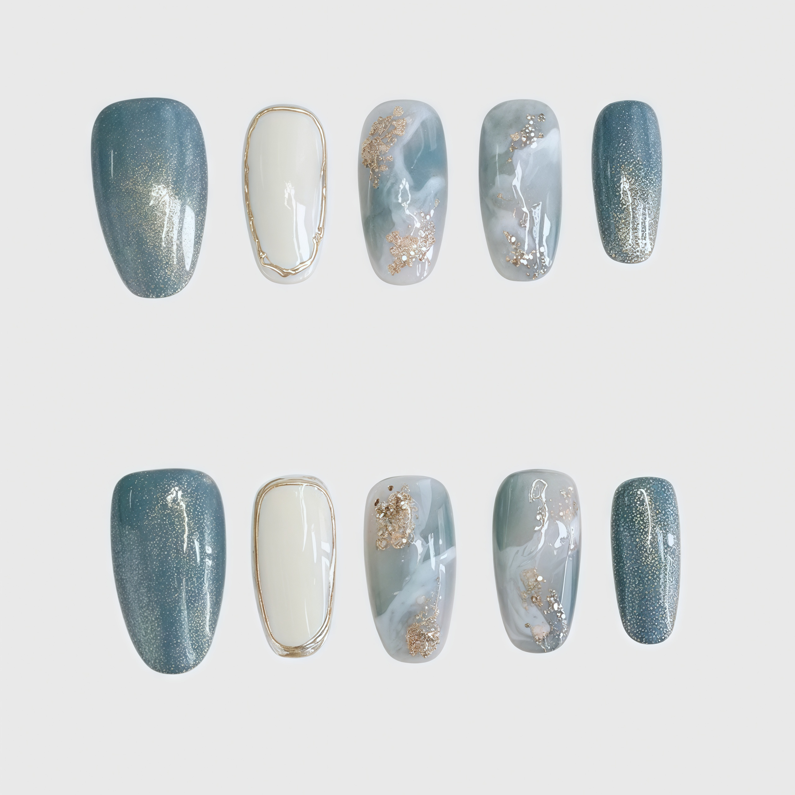 Round press-on nails with blue marble pattern, white accent nails, and gold foil decoration, combining elegance and simplicity for a refined nail look. Main image