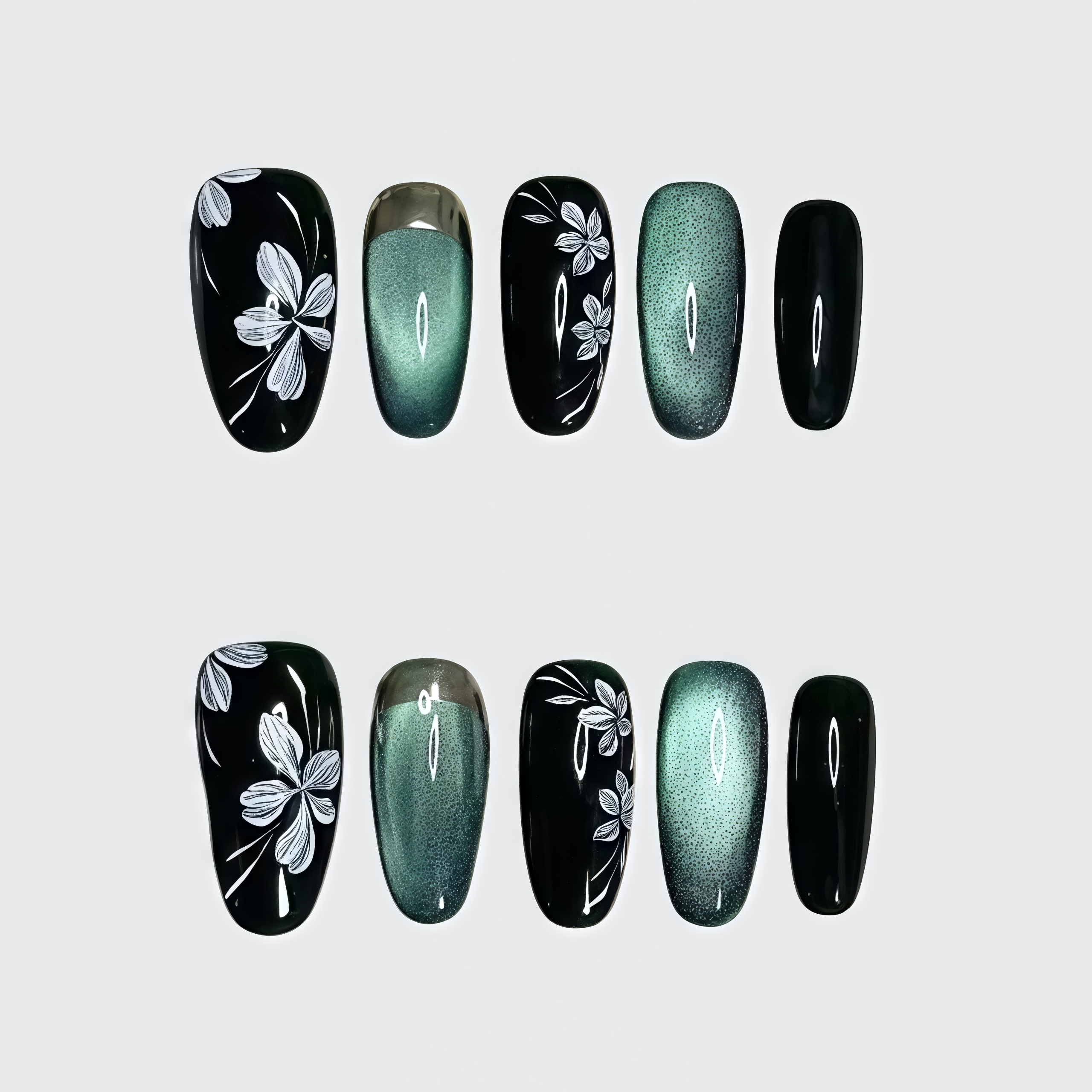 Oval-shaped green cat eye press-on nails with white floral line detailing and glossy finish. Main image